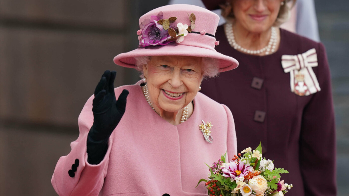 Queen Elizabeth the Second smiling and waving